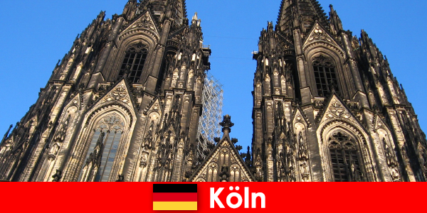 German family vacationers with children like to travel to the city of Cologne