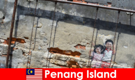 Fascinating and diverse street art in Penang Island amazes strangers