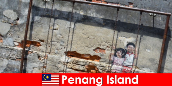 Fascinating and diverse street art in Penang Island amazes strangers