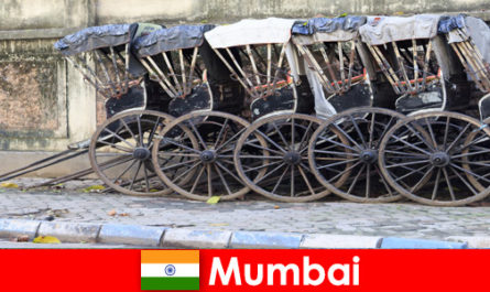 Mumbai in India offers rickshaw rides through crowded streets for the travel enthusiast