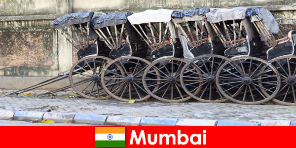 Mumbai in India offers rickshaw rides through crowded streets for the travel enthusiast