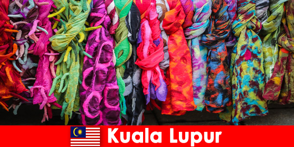 Cultural tourists in Kuala Lumpur Malaysia experience the excellent craftsmanship