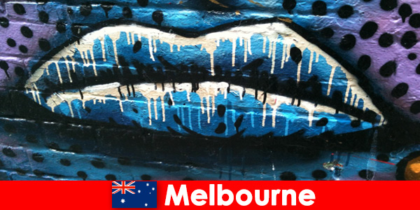 Travelers admire the world famous street arts of Melbourne Australia