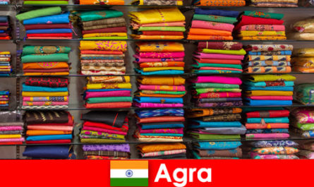 Tour groups from abroad buy cheap silk fabrics in Agra India