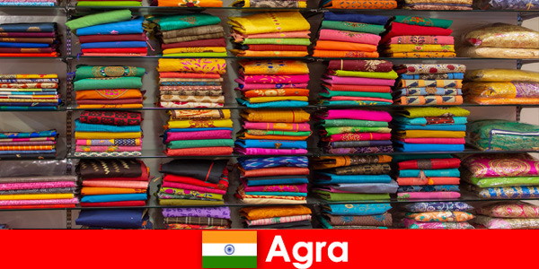 Tour groups from abroad buy cheap silk fabrics in Agra India