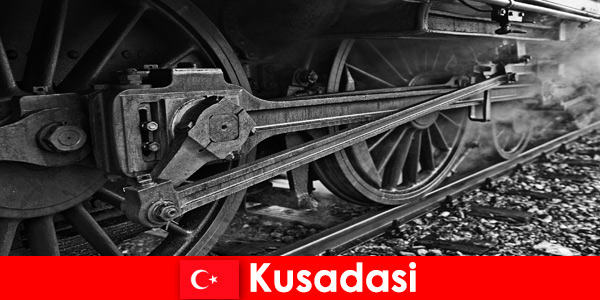 Hobby tourists visit the open-air museum of old locomotives in Kusadasi Turkey