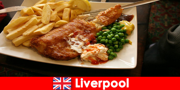 Holidaymakers dine traditionally and nationally in Liverpool England