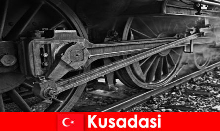 Hobby tourists visit the open-air museum of old locomotives in Kusadasi Türkiye