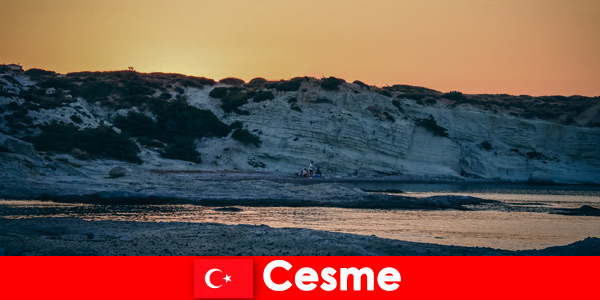 Vacationers love long walks on the beach in Cesme Türkiye