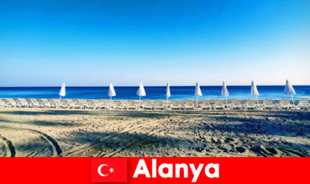 Recommendation enjoy holidays in Alanya Türkiye with children swimming at the beach