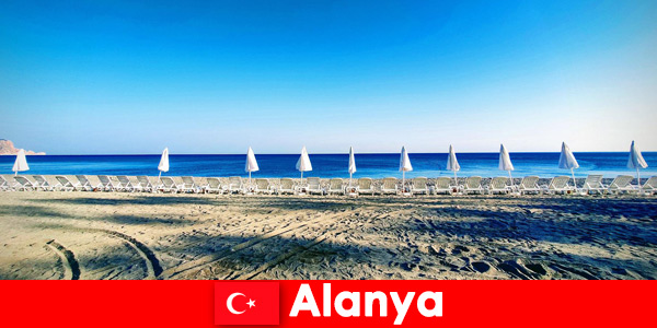 Recommendation enjoy holidays in Alanya Türkiye with children swimming at the beach