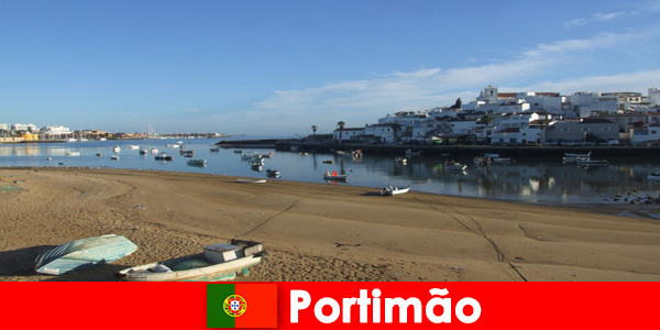 Small boats, crystal clear water and gorgeous weather in Portimão