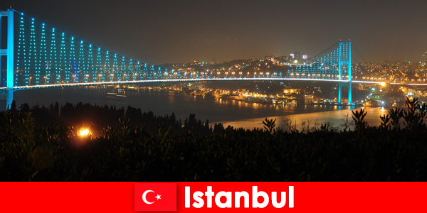 Colorful lights and crowds of people brighten up the night in Istanbul